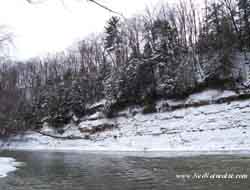 A winter view of the Shale Cliffs above the Grand River at Riverside Park, In Lake County, Ohio.